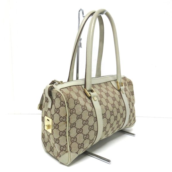 37885435 2 Gucci Gg Pattern Jacquard Handbag Beige