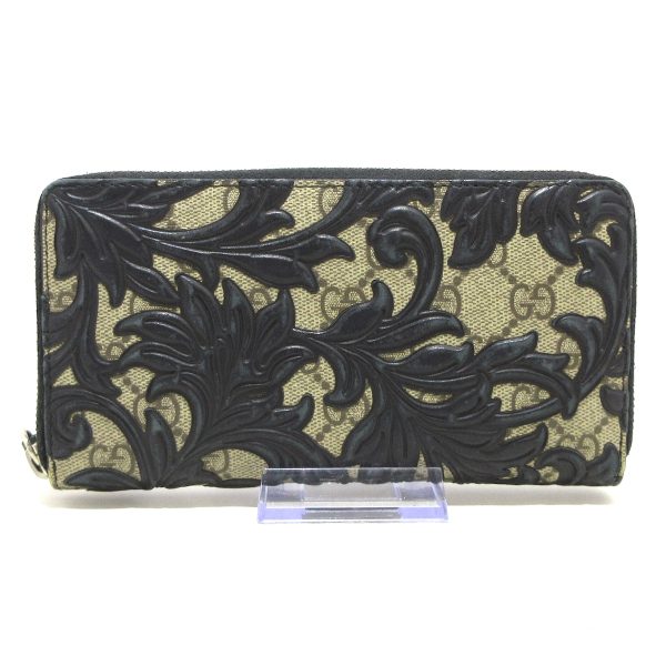 37885491 1 Gucci Arabesque Pvc Wallet Beige