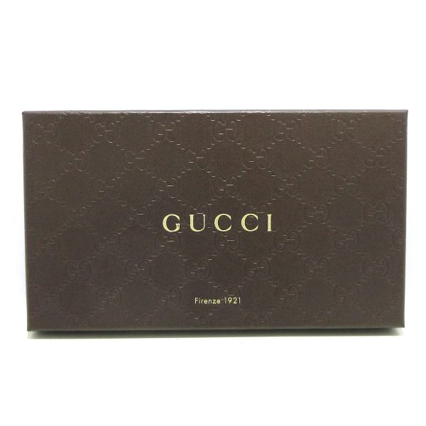 37885491 10 Gucci Arabesque Pvc Wallet Beige