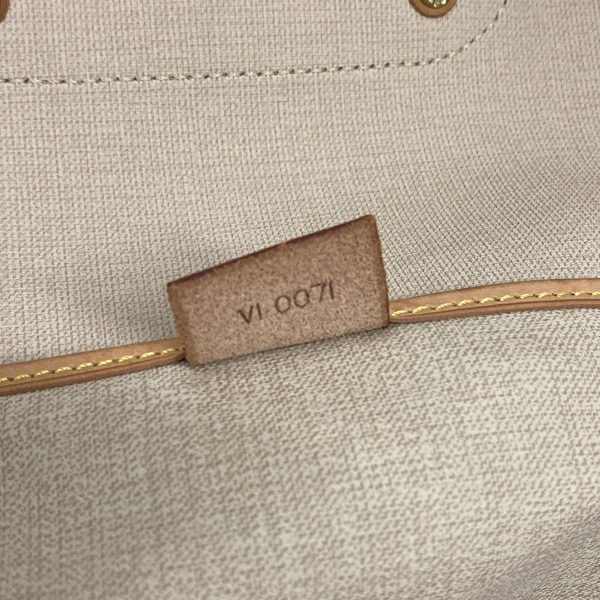 37916748 9 Louis Vuitton Excursion Monogram Canvas Handbag Brown