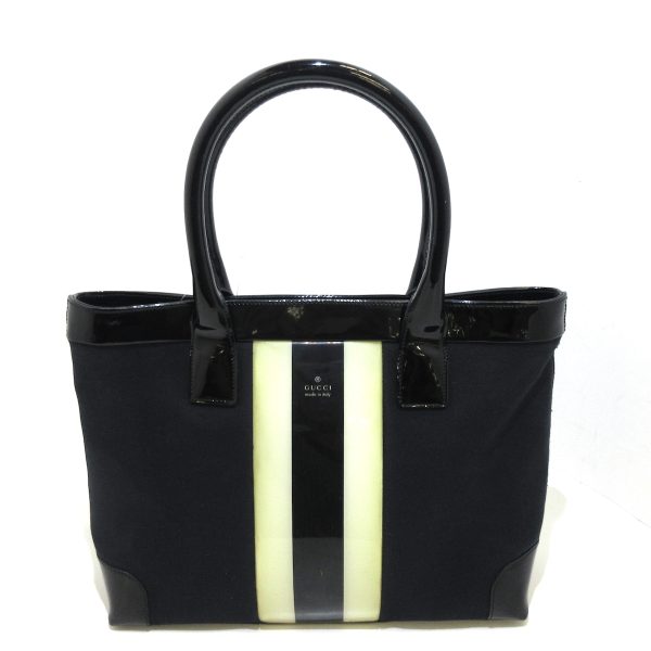 37917764 1 Gucci Canvas Vinyl Enamel Handbag Black White