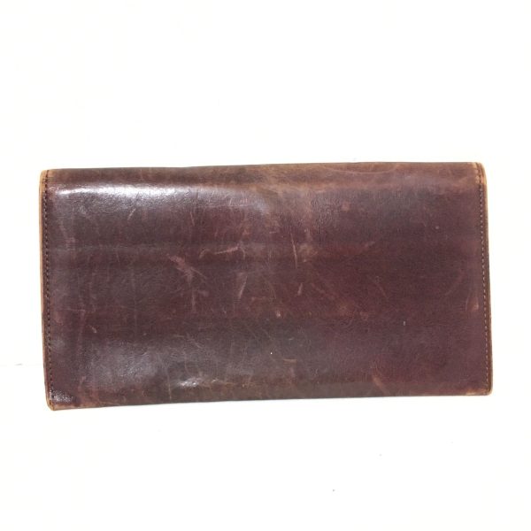 37931449 2 Yves Saint Laurent Embossed Leather Long Wallet Bordeaux