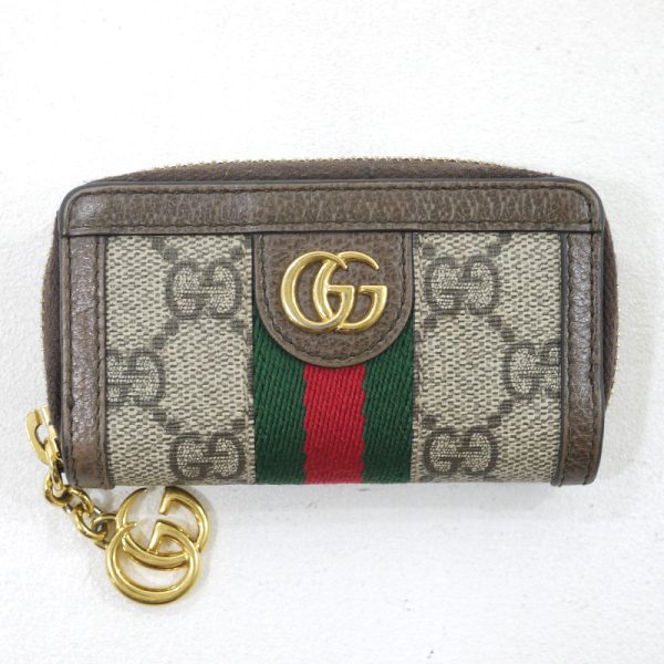 4 2 Gucci GG Supreme Round Zipper Key Case Beige