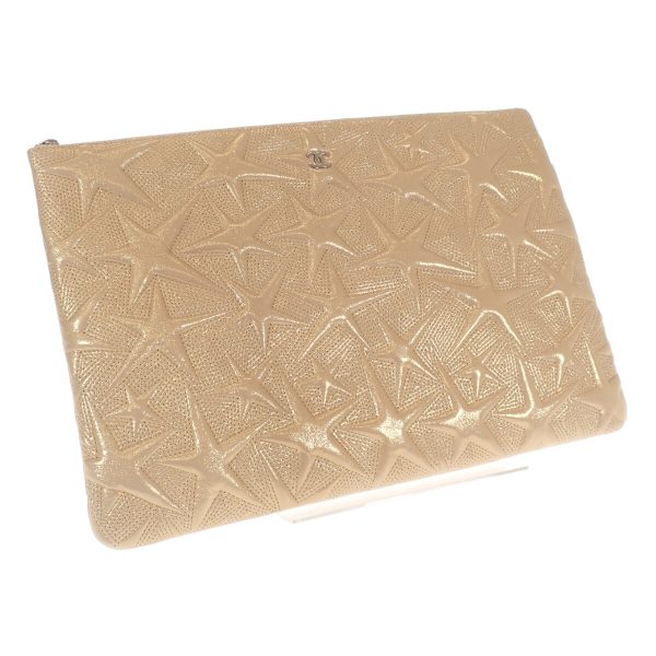 441014 01 Chanel Star Motif Clutch Bag Metallic Gold