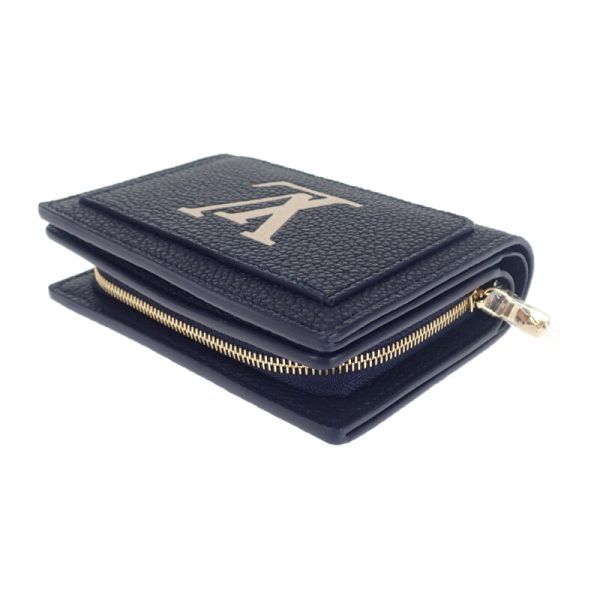 445305 04 Louis Vuitton Bifold Wallet Empreinte Navy Creme