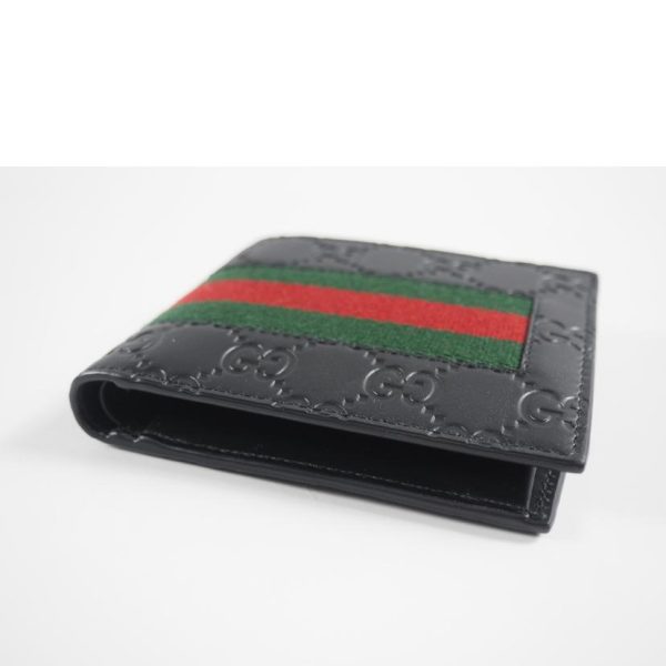 47118 3 Gucci GG Supreme Bi fold Wallet