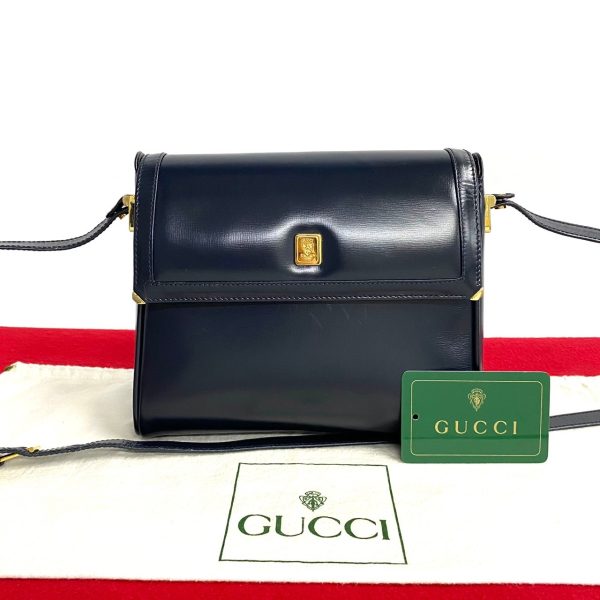 488l1876596 1 Gucci Vintage Vintage Crest Leather Mini Shoulder Bag Navy