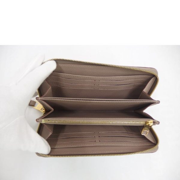 49590 4 Louis Vuitton Zippy Empreinte Wallet Brown