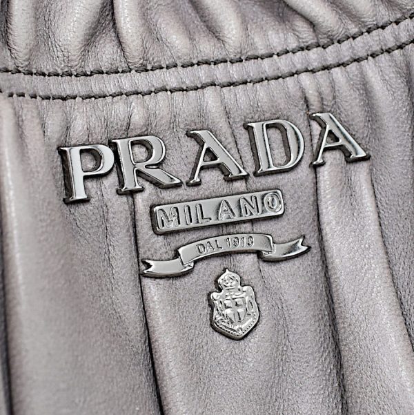 5000105884102706 9 Prada gathered leather lavender gray silver hardware metal logo