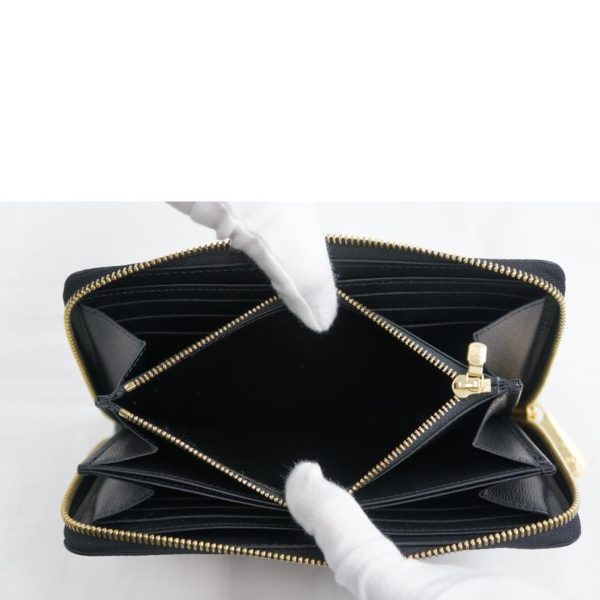 51101 5 Louis Vuitton Zippy Wallet Lovelock Epi Black