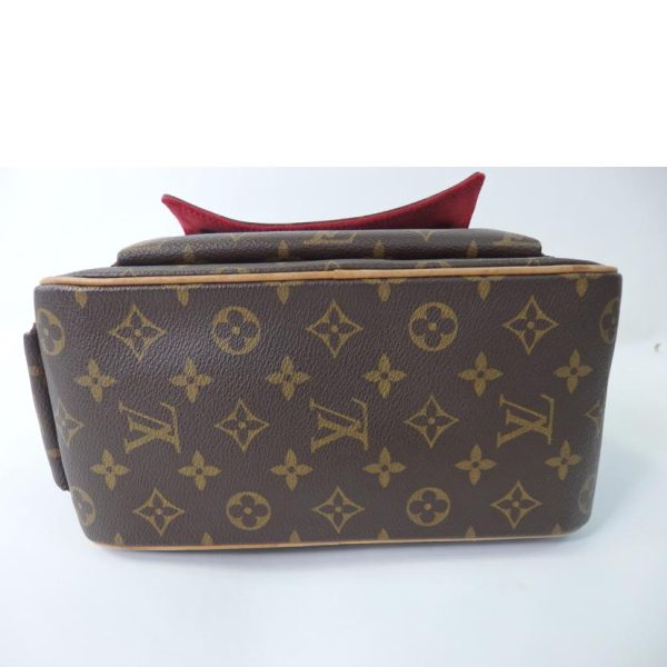 53617 4 Louis Vuitton Exantrie Cité Monogram Handbag Brown