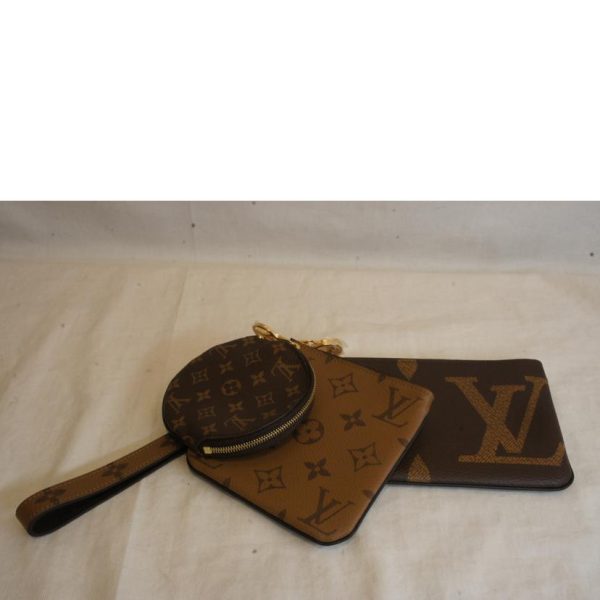 54782 2 Louis Vuitton Pochette Trio Monogram Giant