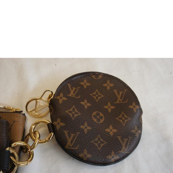 54782 3 Louis Vuitton Pochette Trio Monogram Giant