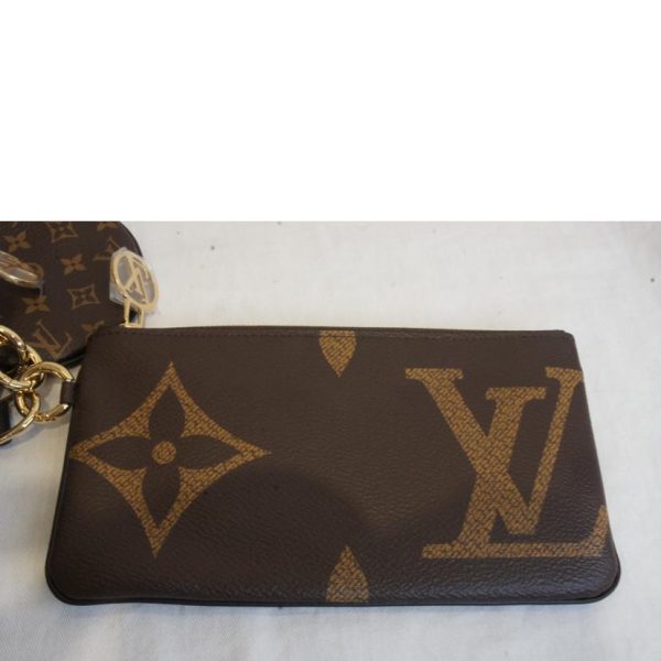 54782 7 Louis Vuitton Pochette Trio Monogram Giant