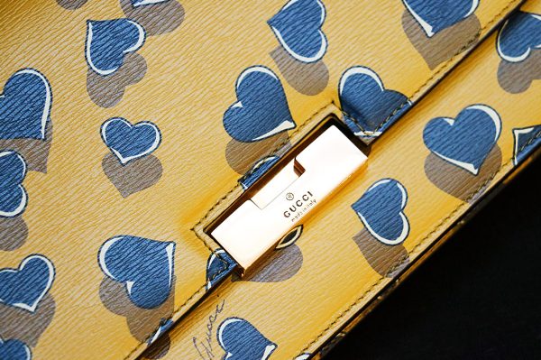 5758 4 Gucci Heart Print Clutch Bag Mustard