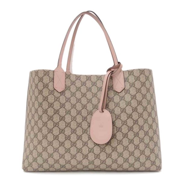 60853 1 Gucci GG Supreme Reversible Tote Pink