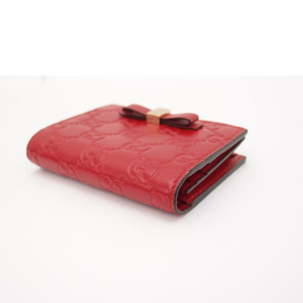 61099 3 GUCCI Red Ladies Guccissima Bi Fold Billfold