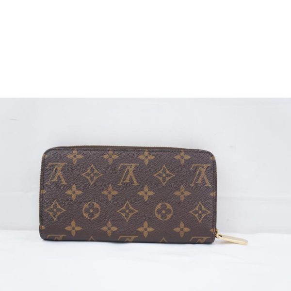 66116 2 Louis Vuitton Zippy Wallet Lovelock Monogram Wallet