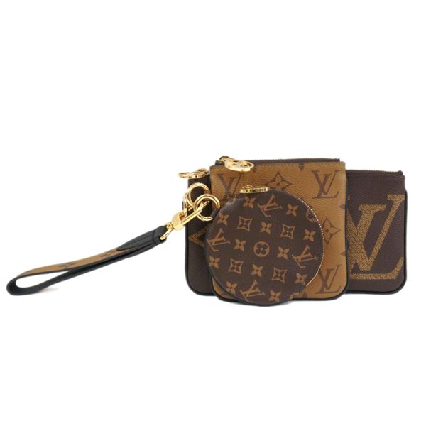 70805 1 Louis Vuitton Pochette Trio Monogram Giant Reverse Brown