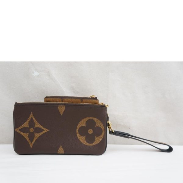 70805 2 Louis Vuitton Pochette Trio Monogram Giant Reverse Brown