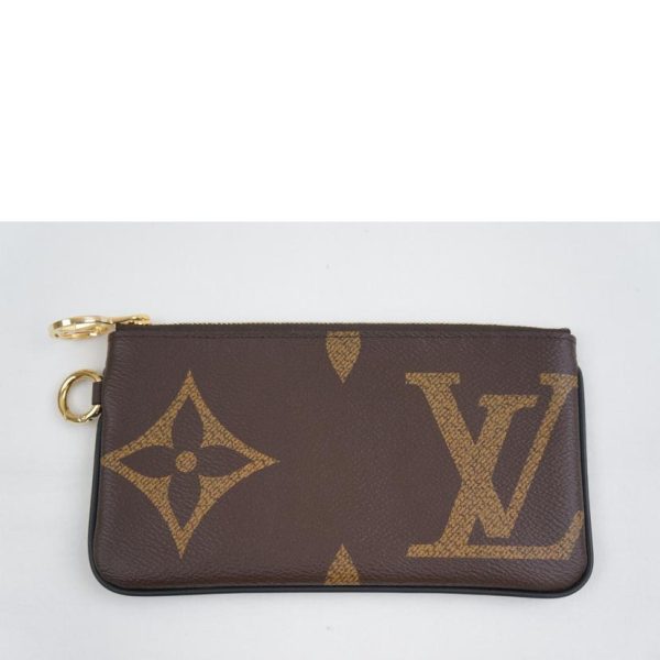 70805 4 Louis Vuitton Pochette Trio Monogram Giant Reverse Brown