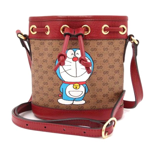 72591 1 Gucci GG Supreme Mini Bucket Bag Doraemon Collaboration Beige