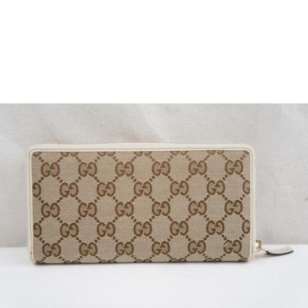 73585 2 Gucci GG Canvas Round Zipper Wallet Brown