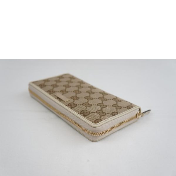 74520 3 Gucci GG Canvas Round Zipper Wallet Brown