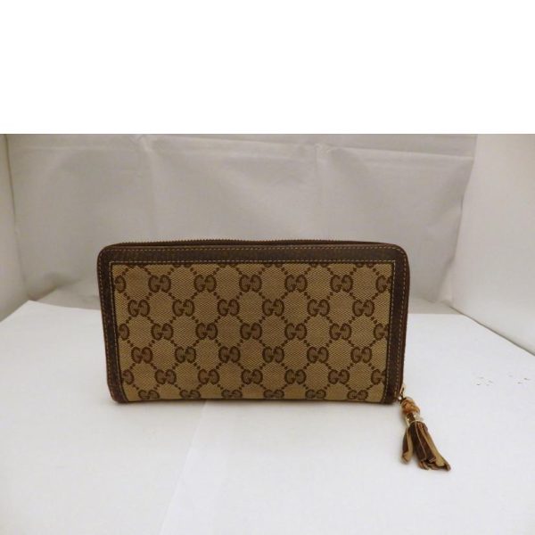 75551 1 Gucci Bamboo Tassel Leather Round Zipper Wallet Brown