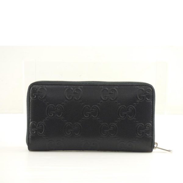 77137 2 Gucci GG Embossed Round Zip Organizer Long Wallet