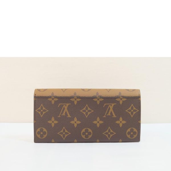 78166 2 Louis Vuitton Portefeuille Emily Monogram Reverse Wallet Brown