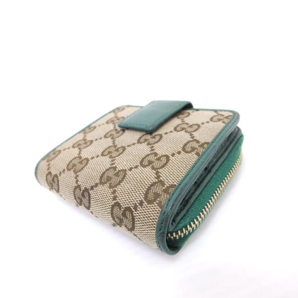 84082 3 Gucci Gg Canvas Round Zipper Bifold Wallet