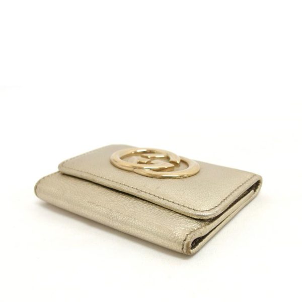 84239 3 Gucci Interlocking G 6 Key Case Gold