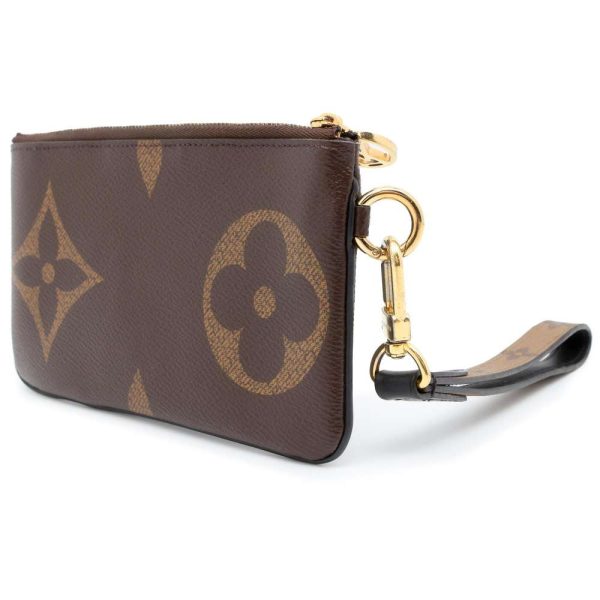 9464414 02 Louis Vuitton Pochette Trio Pouch Monogram Reverse Giant Brown