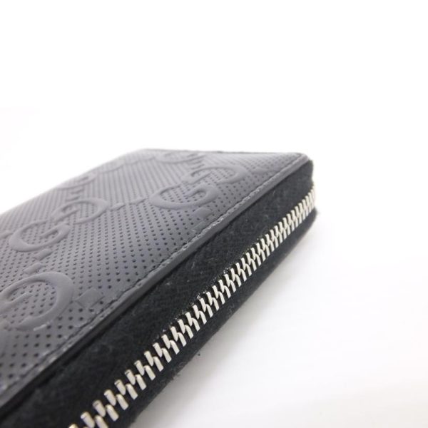 95712 7 Gucci GG Embossed Round Zipper Long Wallet