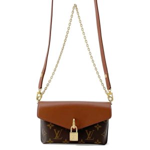 9723542 01 Louis Vuitton Calfskin Leather LockMe Shoulder Bag Marine Rouge