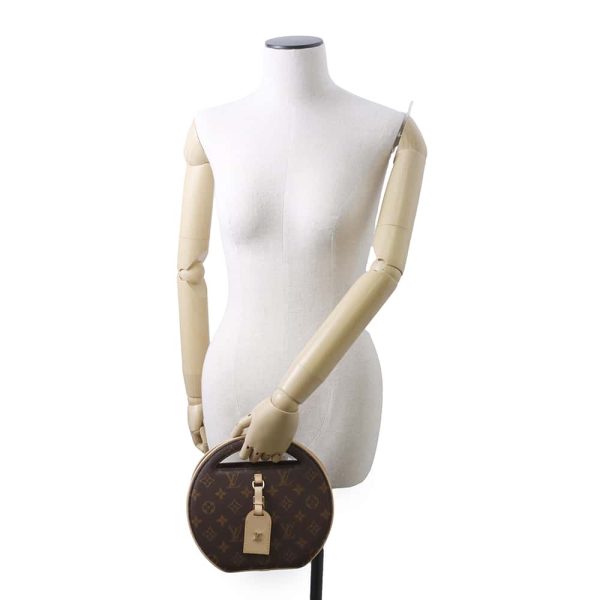 9733121 04 Louis Vuitton Around Me Handbag Monogram