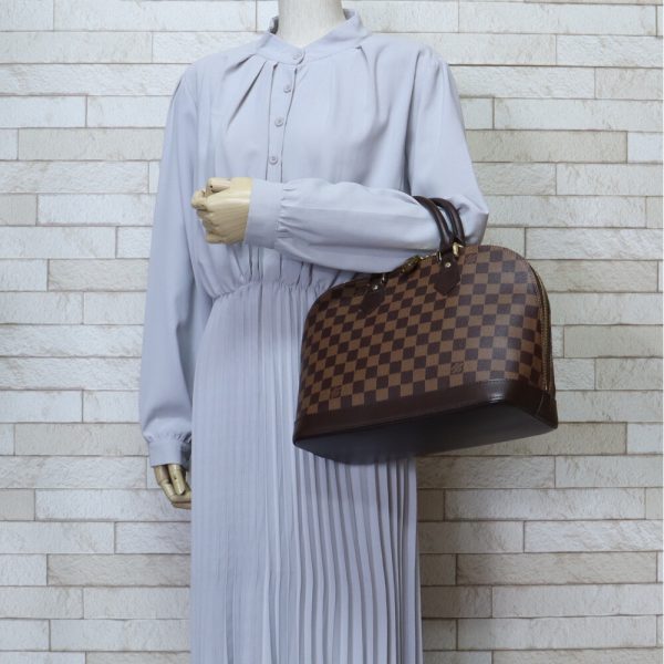 brb01870000007268 2 Louis Vuitton Alma Handbag Damier Canvas Brown