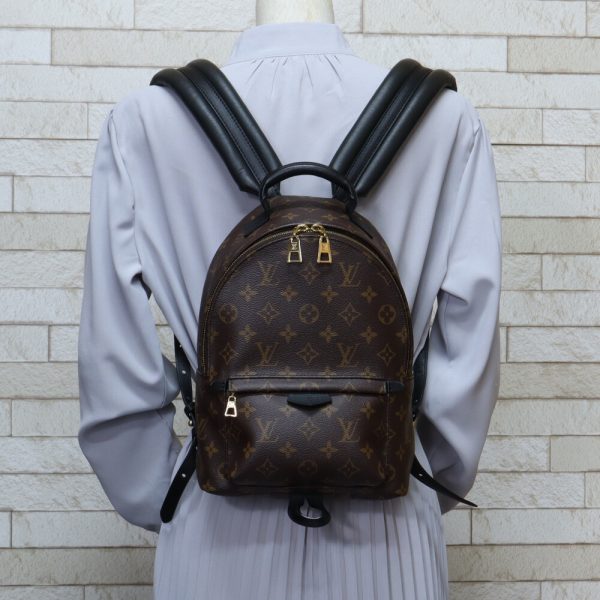 brb10010000009963 2 Louis Vuitton Balm Springs Monogram Canvas Daypack Brown