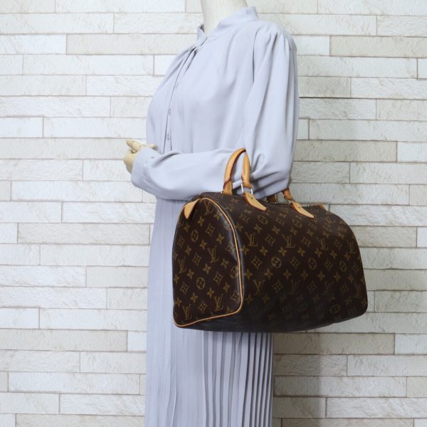 brb10010000014547 2 Louis Vuitton Speedy 30 Handbag Monogram Canvas Brown