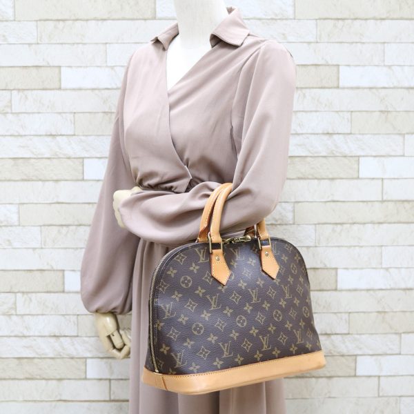 brb31701816 2 Louis Vuitton Alma Monogram Handbag Brown