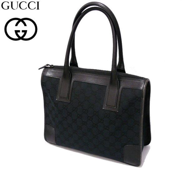 imgrc0063527841 Gucci GG Canvas Leather Handbag Black