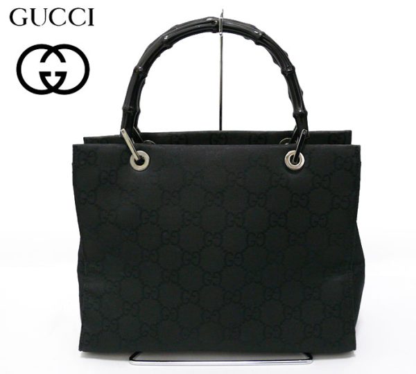 imgrc0063586958 Gucci GG Nylon Bamboo Handbag Black