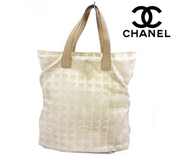 imgrc0066477335 Chanel New Travel Line Vertical Tote Bag Canvas Beige