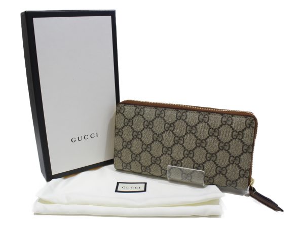 imgrc0076191362 Gucci Zip Around Wallet GG Supreme Canvas Brown