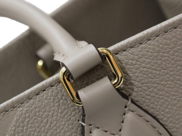 imgrc0083910394 Louis Vuitton On The Go MM Empreinte Giant Beige