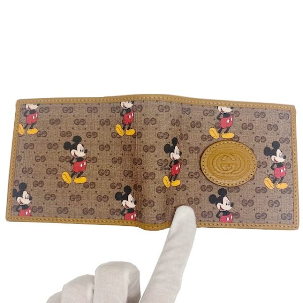 imgrc0084226963 GUCCI Disney GG Supreme Wallet Camel