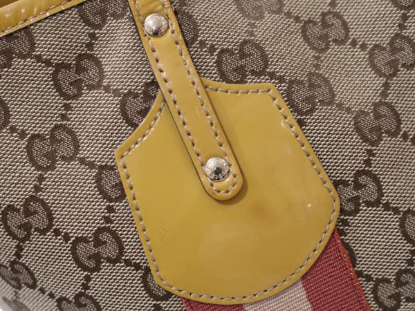 imgrc0086068792 Gucci Tote Bag Sherry Line Enamel GG Yellow Beige