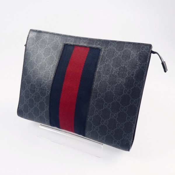 imgrc0089222141 Gucci GG Supreme Web Stripe Clutch Bag