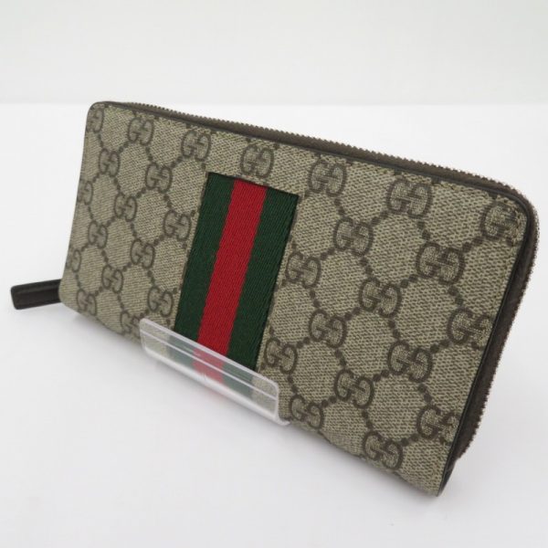 imgrc0089483073 Gucci GG Supreme Web Zip Around Wallet Beige